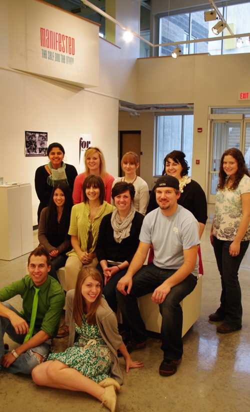 Group photograph at the conclusion of gallery event of student work